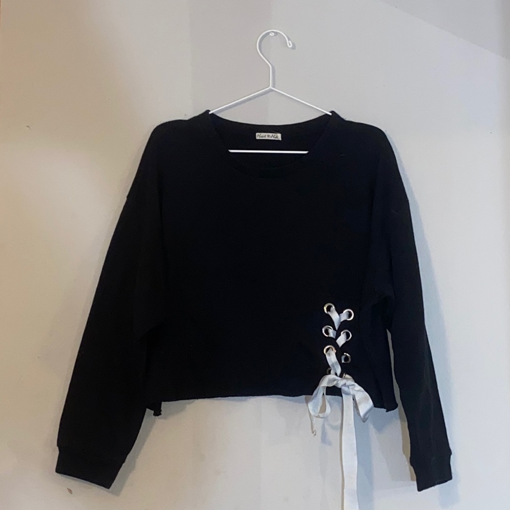 Cropped black sweater with left detailing